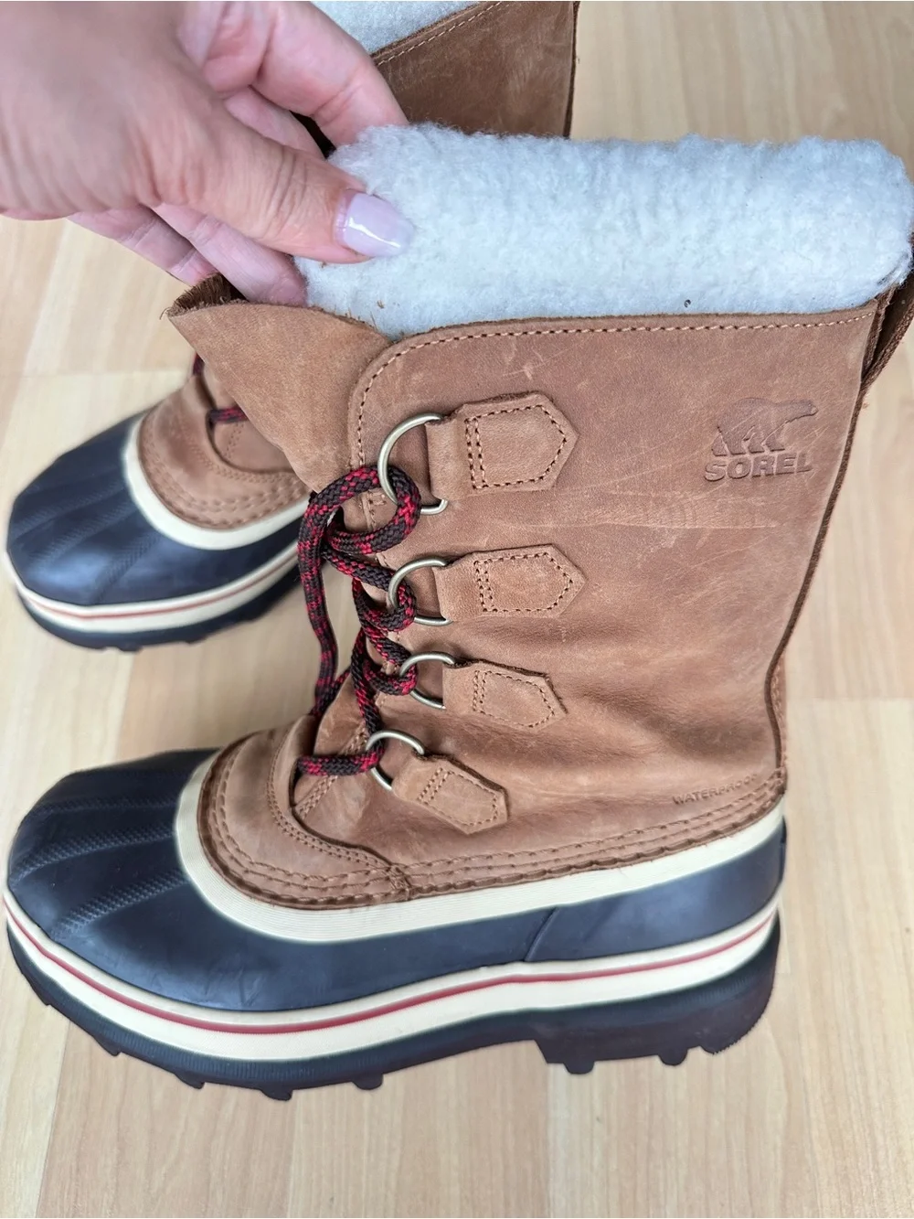 Sorel Tan and Black Waterproof Winter Boot with Red-Accent Laces